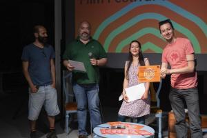 Premiazione di Tommaso Perfetti e Guglielmo Trupia (ENECEfilm) con Filippo Ticozzi (Giuria Lungometraggi & Mediometraggi) e Marina Resta